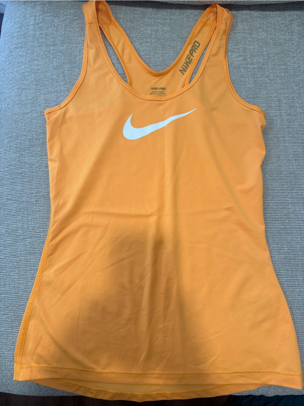 Small orange Nike pro dry fit tank